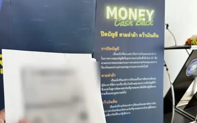 Documents for a bank unfreeze case at the Cyber Police office in Bangkok, passport details hidden
