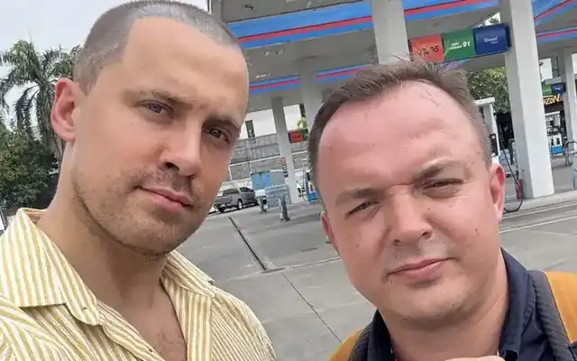 UnblockPro.Asia founder with a client after a visit to the police in Bangkok