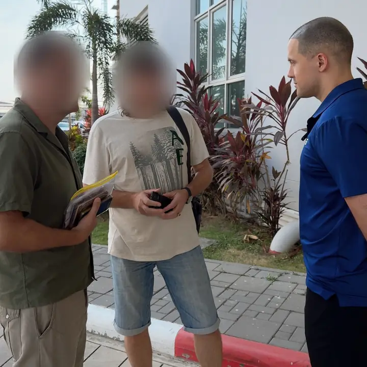 UnblockPro.Asia interpreter with clients before a meeting in Bangkok